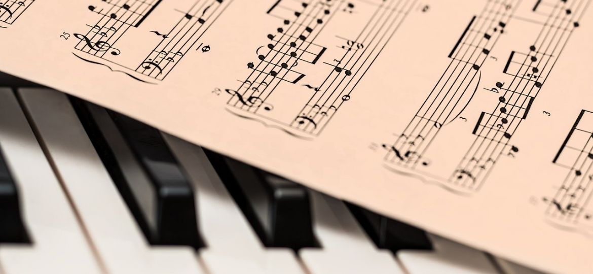 Sheet music on a keyboard.